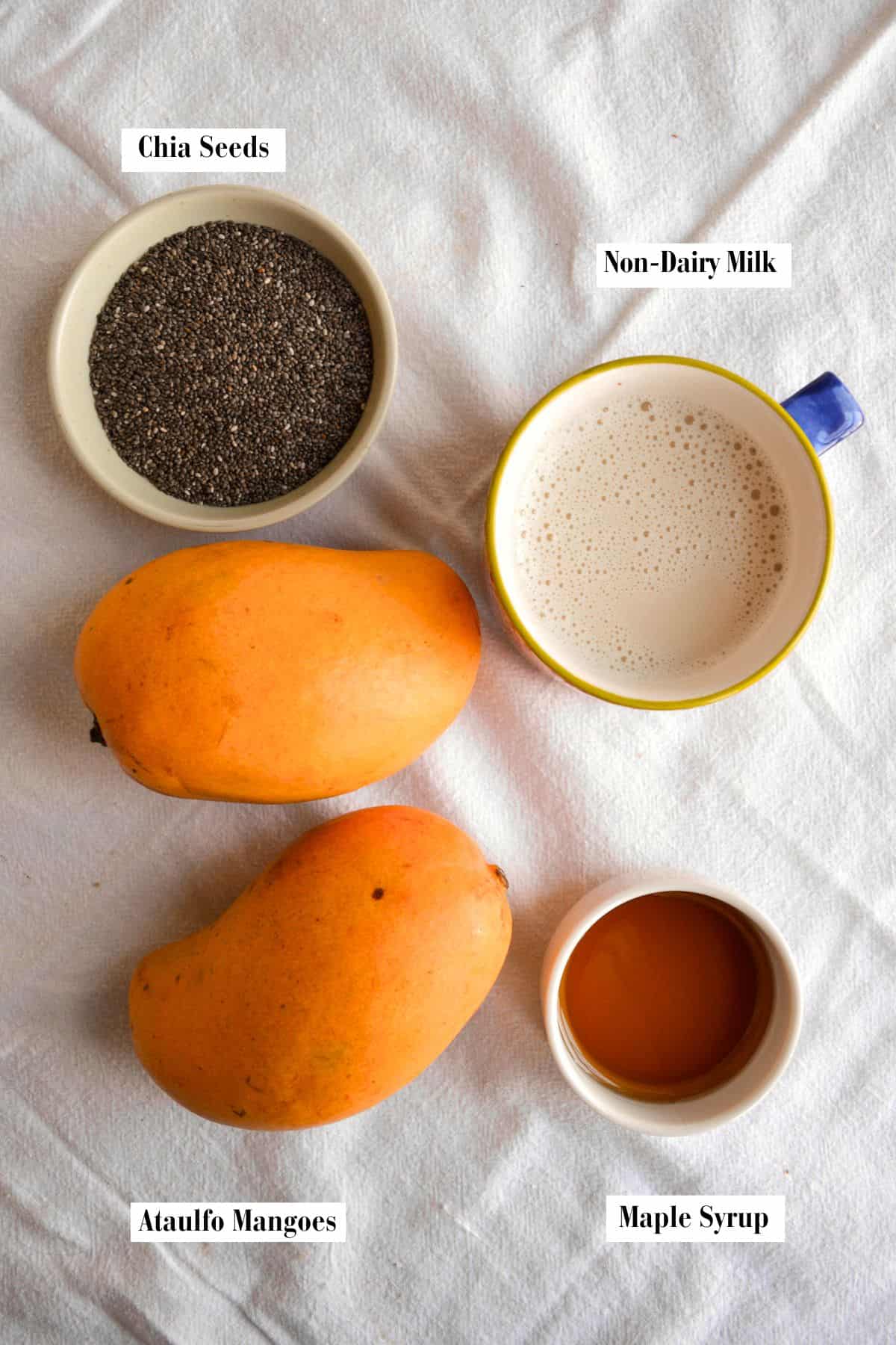 Ingredients for this recipe in small bowls on a linen surface.