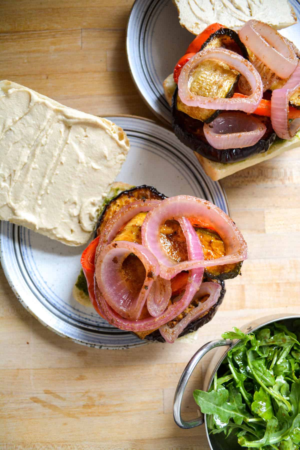 Roasted vegetables piled on a ciabatta roll.