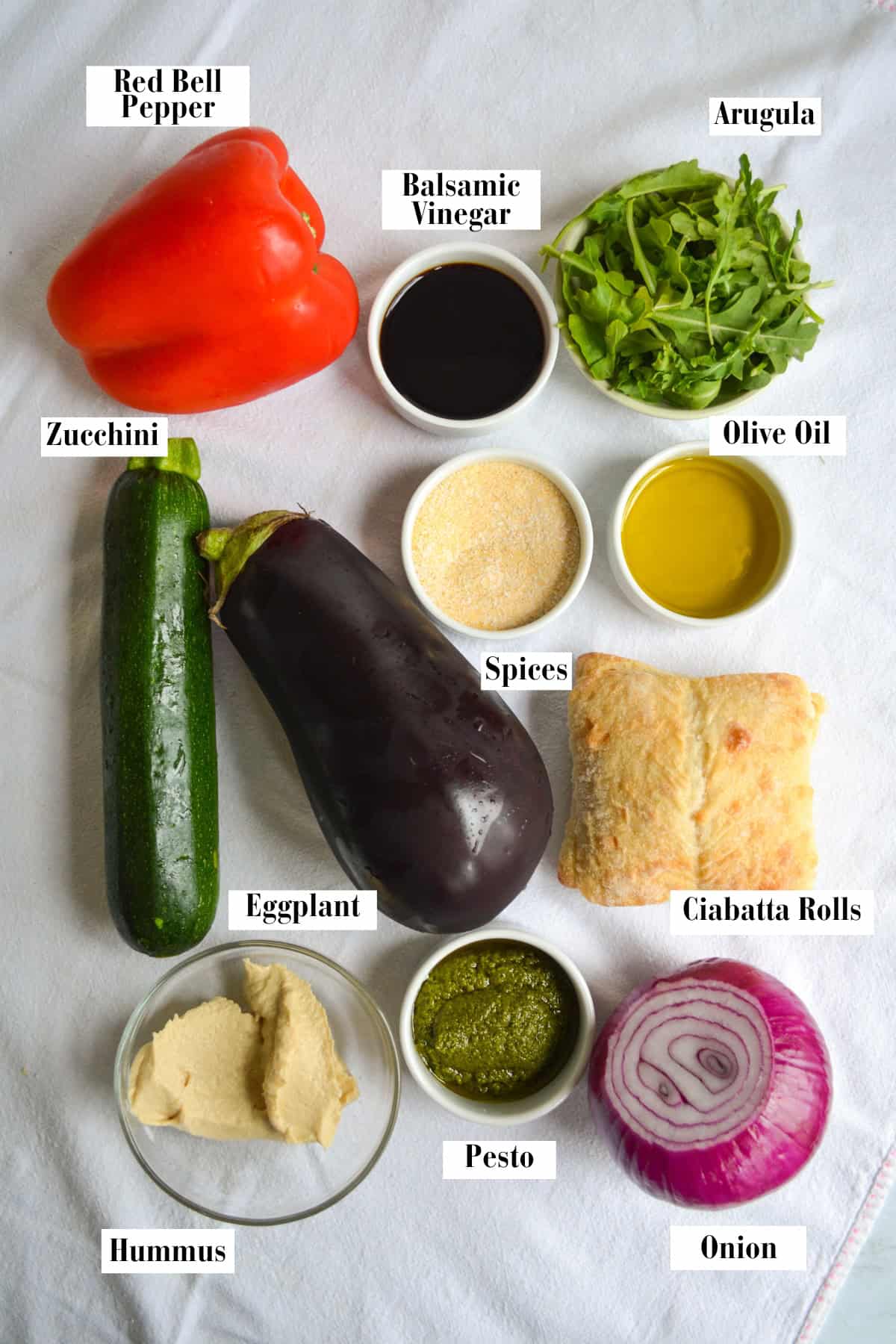 Ingredients for this recipe in small bowls on a linen surface.