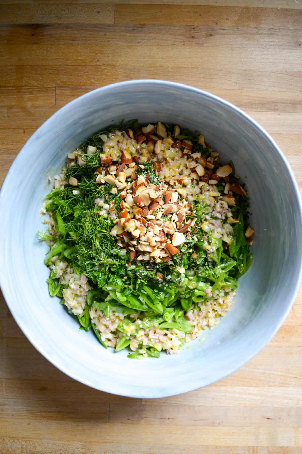 Salad ingredients in a large mixing bowl.
