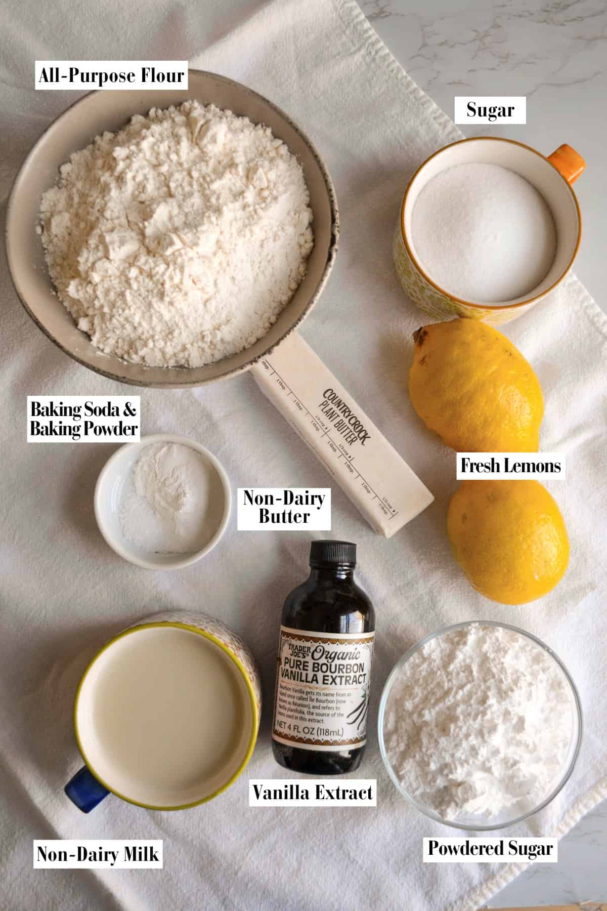 Ingredients for this recipe in small bowls on a linen surface.