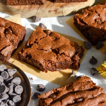 A Chocolate Chocolate Chip Cookie Bar with a bite taken out of it.