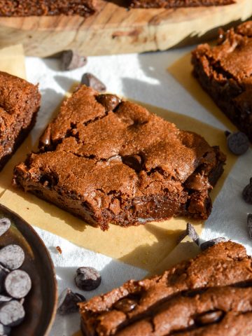 A Chocolate Chocolate Chip Cookie Bar with a bite taken out of it.