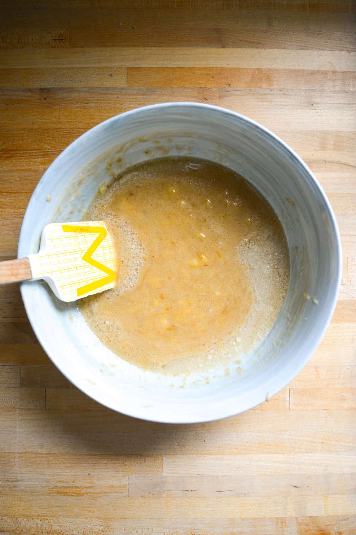 Wet ingredients in a large mixing bowl.