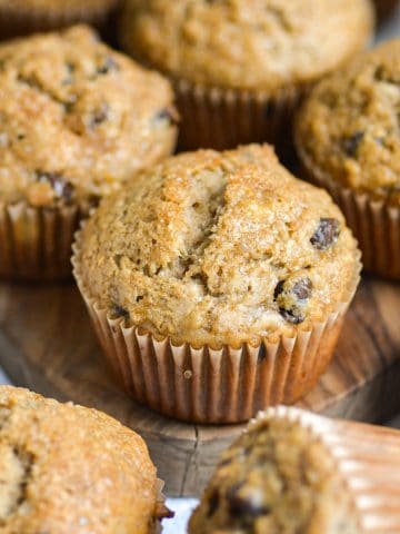 Vegan Banana Muffins on a small wooden board.