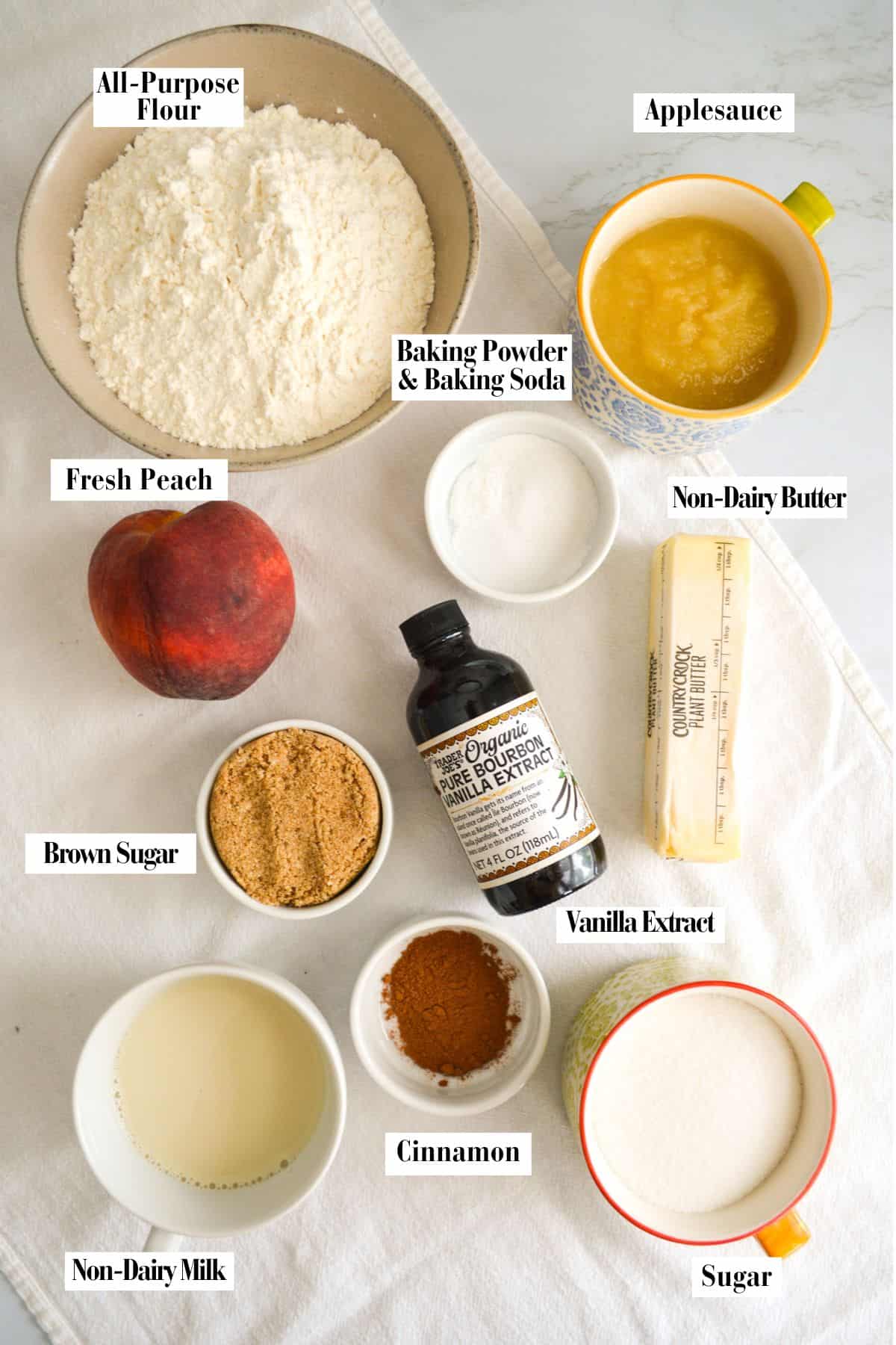 Ingredients for this recipe in small bowls on a linen surface.