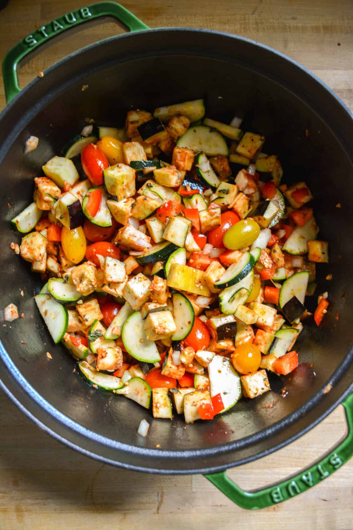Chopped vegetables in a large Dutch oven.