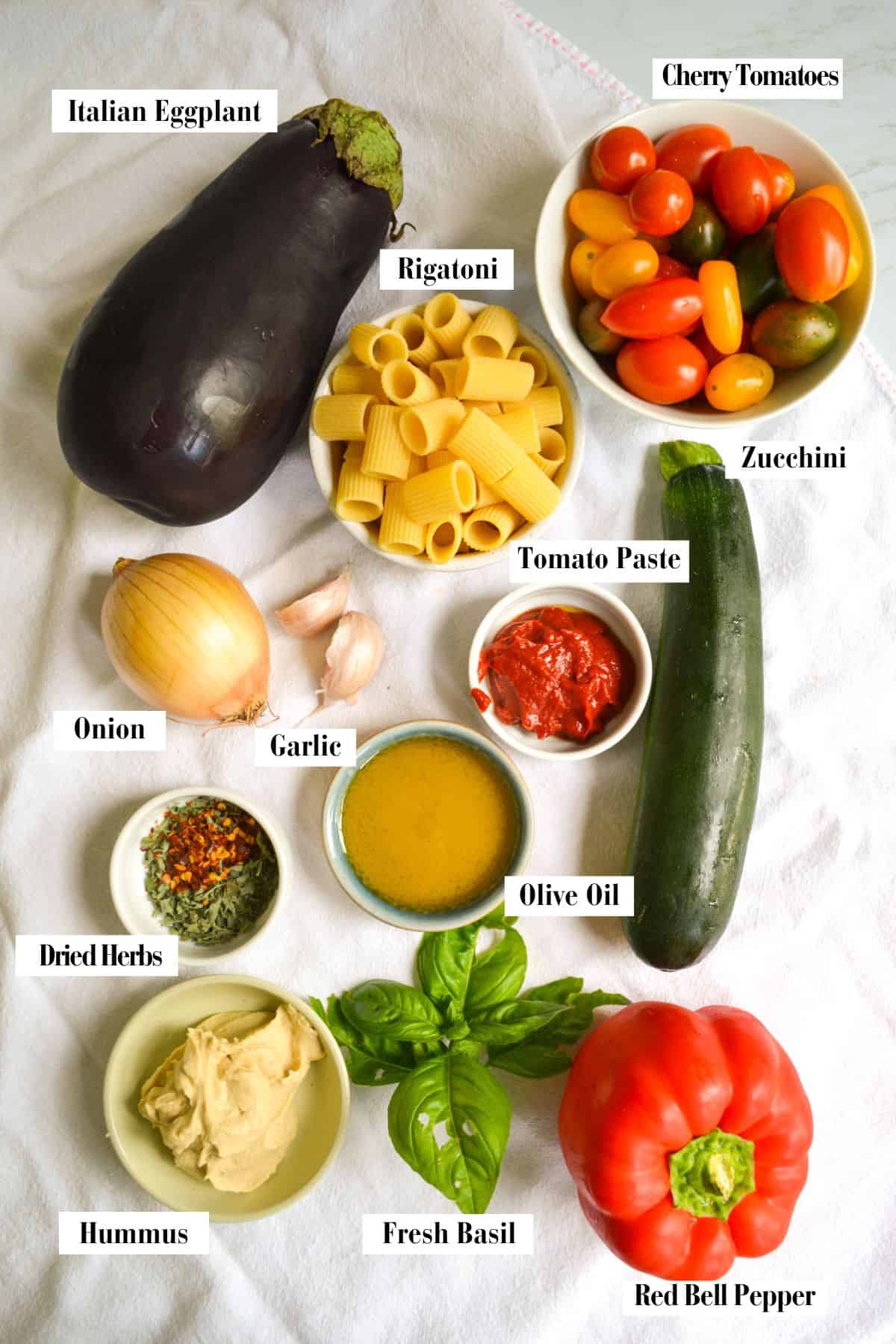 Ingredients for this recipe in small bowls on a linen surface.