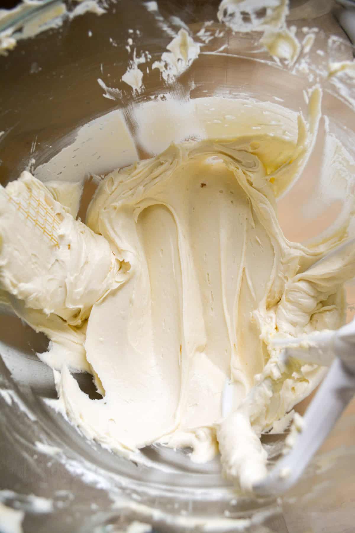 Bourbon buttercream frosting in a mixing bowl.