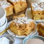 A piece of Vegan Apple Crumb Cake on a small white plate.